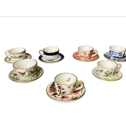 Appraisal: A collection of Seven miniature Coalport teacups saucers One is