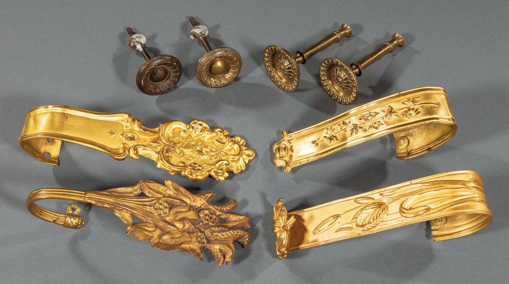 Appraisal: Eleven Pairs of Gilt Metal Tiebacks incl matching with tulips