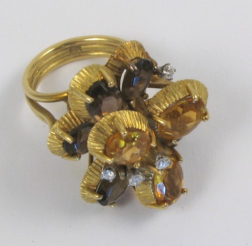 Appraisal: CITRINE AND SMOKY QUARTZ RING k yellow gold and set