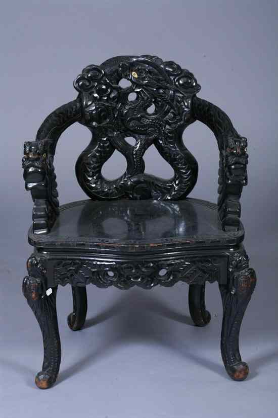 Appraisal: JAPANESE BLACK LACQUERED WOOD ARMCHAIR Dragon decoration - in x