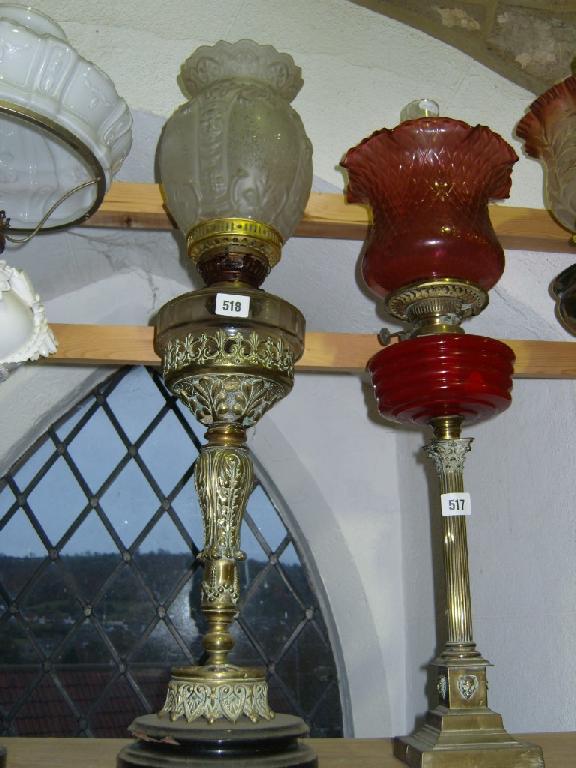 Appraisal: A late th century embossed brass oil lamp base with