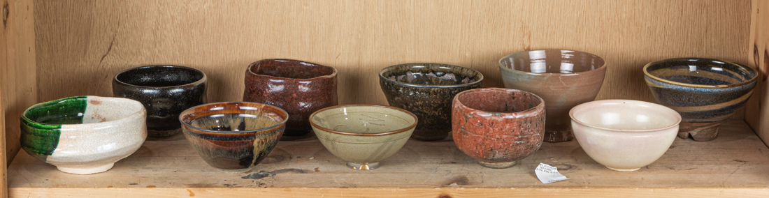 Appraisal: SHELF OF JAPANESE CERAMIC TEA BOWLS Shelf of Japanese ceramic