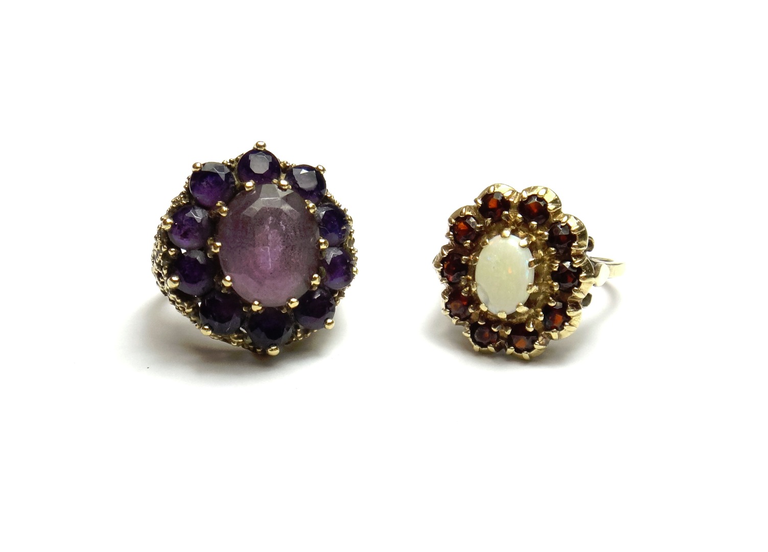 Appraisal: A ct gold and amethyst set eleven stone cluster ring