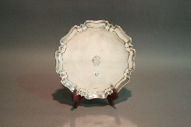 Appraisal: A sterling silver footed salver by Walker and Hall with