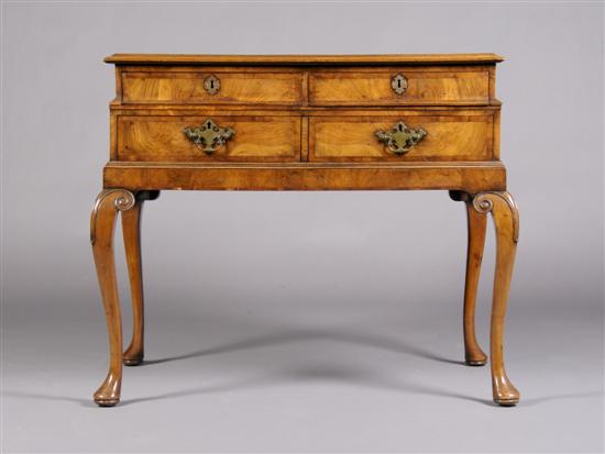 Appraisal: An English Queen Anne Style Walnut Lowboy Height x width