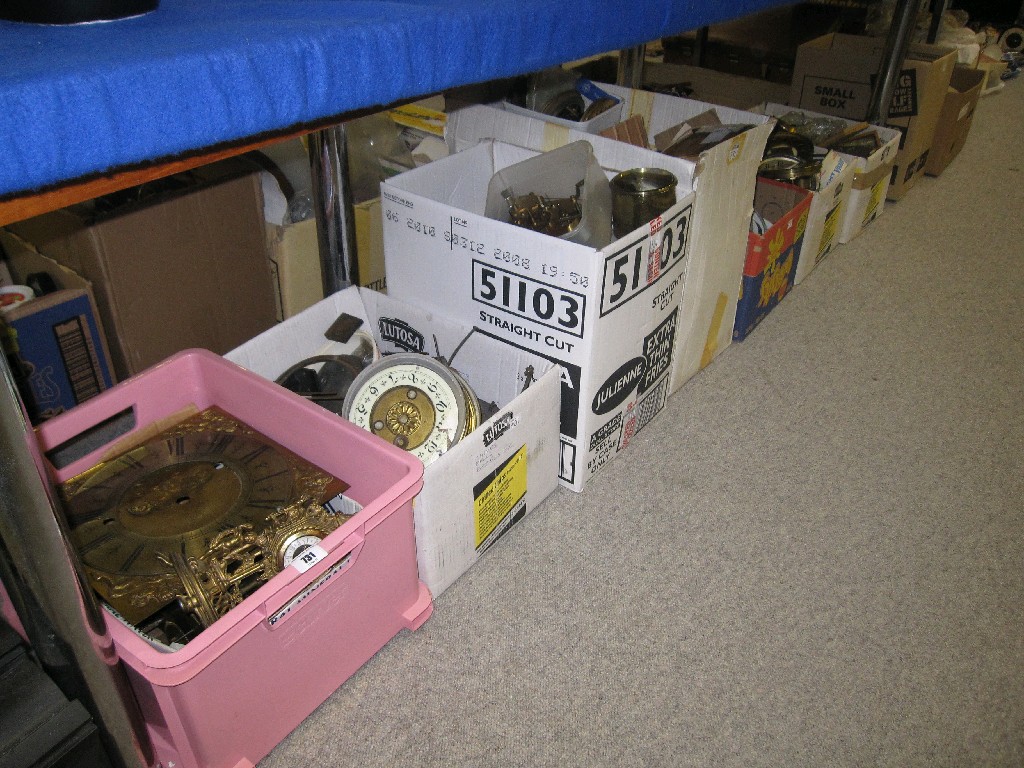 Appraisal: Lot comprising nine boxes of clock mechanisms and parts