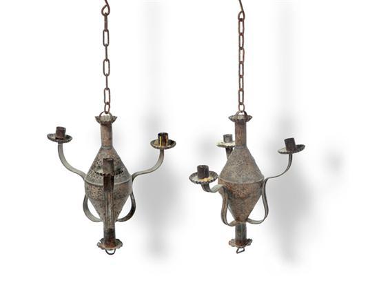 Appraisal: PAIR OF TIN CHANDELIERS European st half- th century Tooled