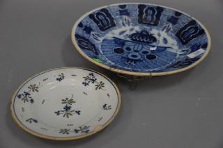 Appraisal: Earthenware charger and plate charge dia in plate dia in