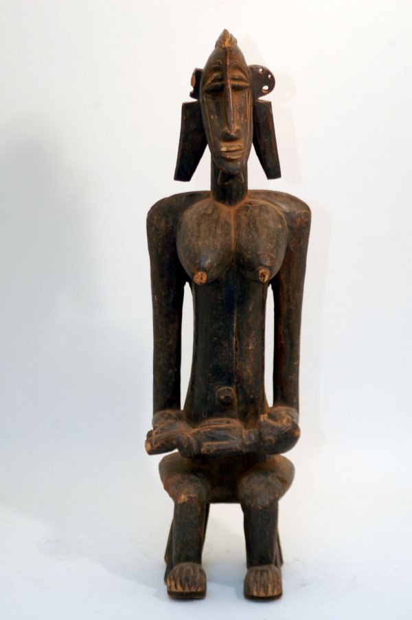 Appraisal: Large Senufo mother and child figure of dark brown patina