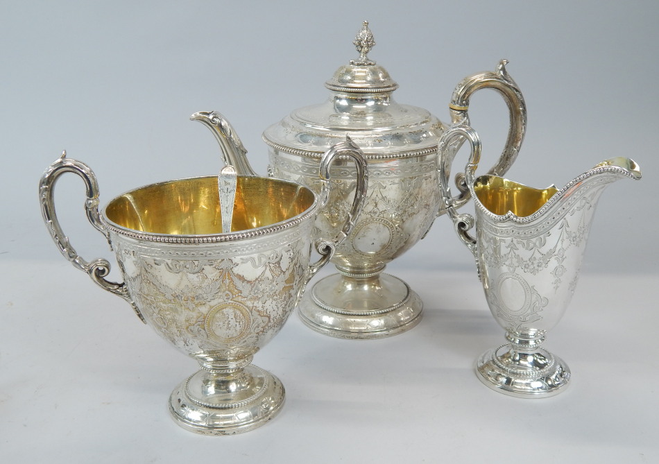 Appraisal: A Victorian silver three piece tea set of urn form