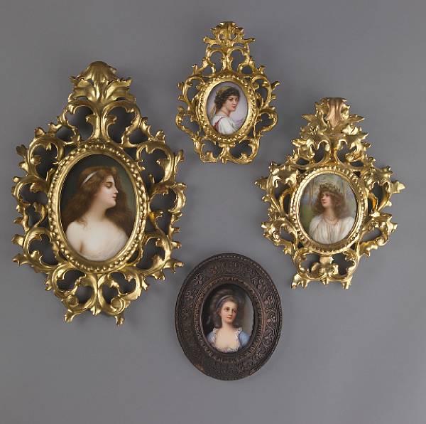 Appraisal: A group of four painted portrait plaques height of largest