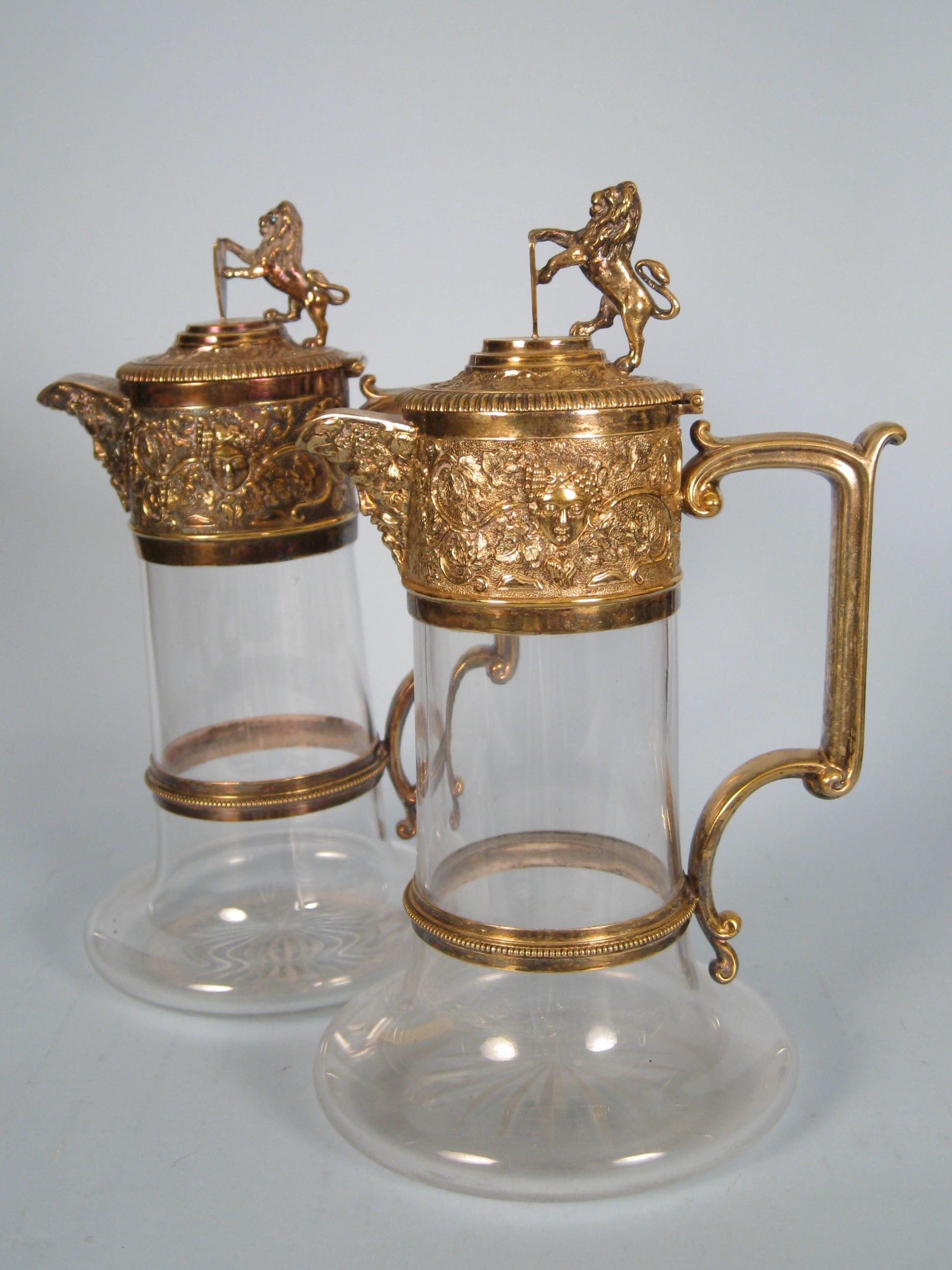 Appraisal: Pair of Elkington Plate and cut glass Claret Jugs embossed