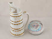 Appraisal: A decorative ceramic jug in the form of a coopered