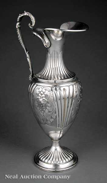 Appraisal: A Continental Silver Ewer th c vasiform with reeded body