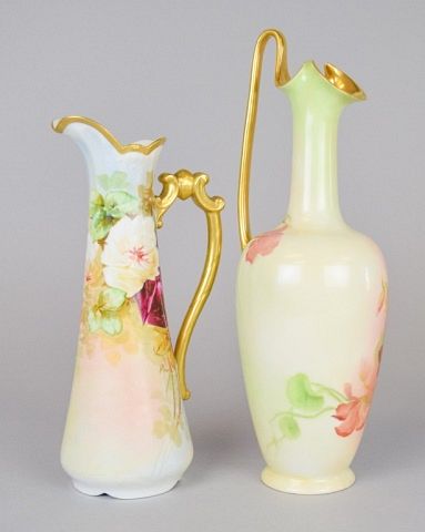 Appraisal: Hand Painted Porcelain Ewers Both with floral motifs and gilt