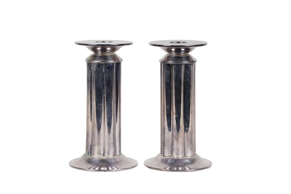 Appraisal: PAIR OF SWID POWELL SILVERPLATE CANDLESTICKSmade in Italy inches high