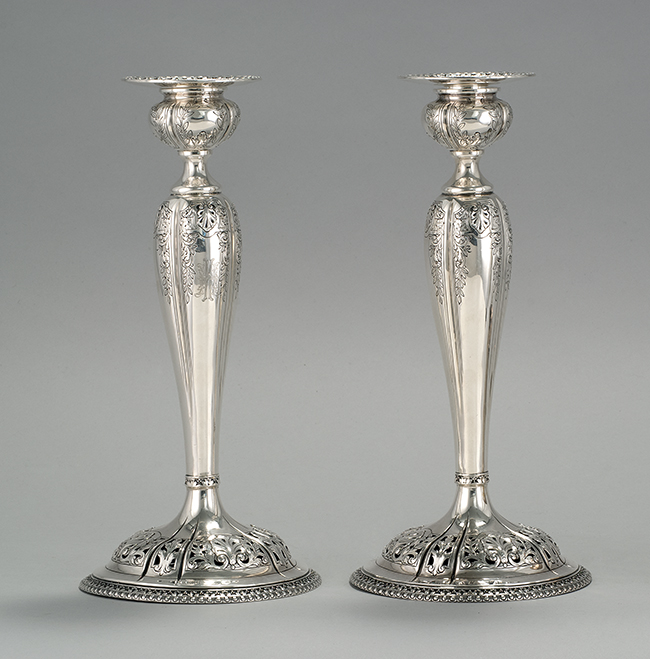 Appraisal: PAIR OF STERLING SILVER WEIGHTED CANDLESTICKS American th CenturyMarked on