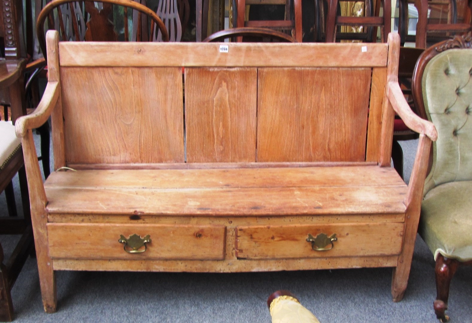 Appraisal: A th century pine open arm settle with two drawer