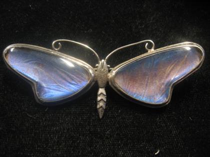 Appraisal: Sterling silver butterfly brooch Unusual fabric wings under clear resin