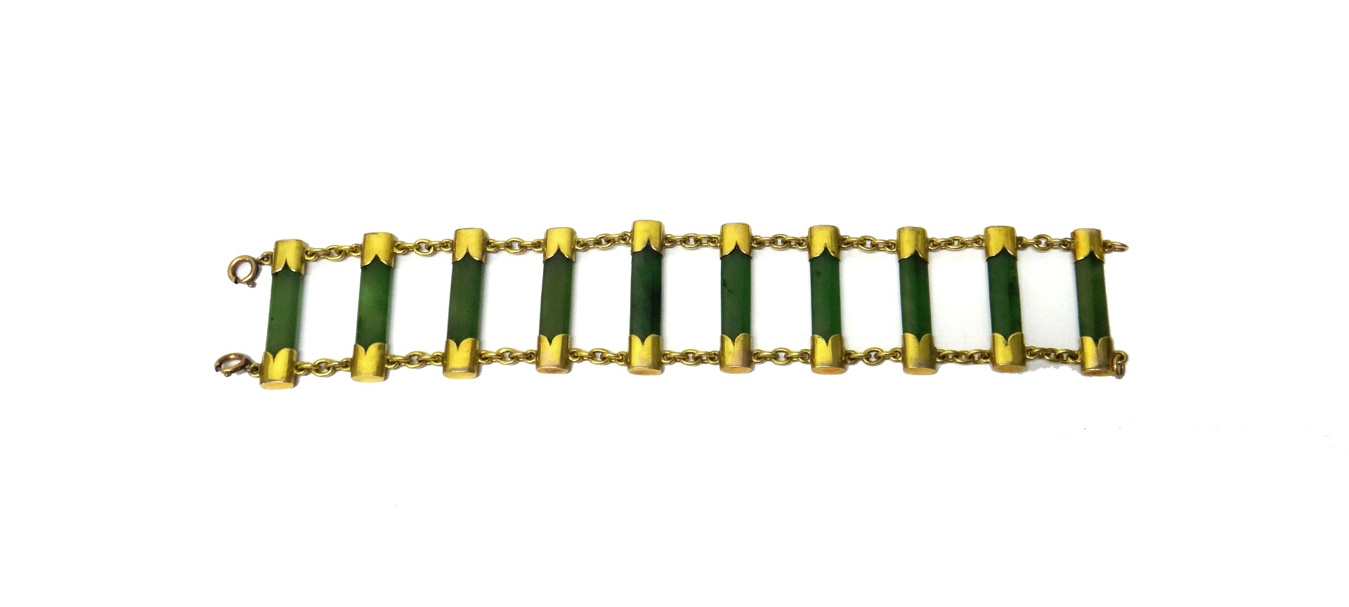 Appraisal: A gold and nephrite bracelet formed as a row of