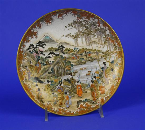 Appraisal: JAPANESE SATSUMA EARTHENWARE GILT DECORATED PLATE depicting women and children