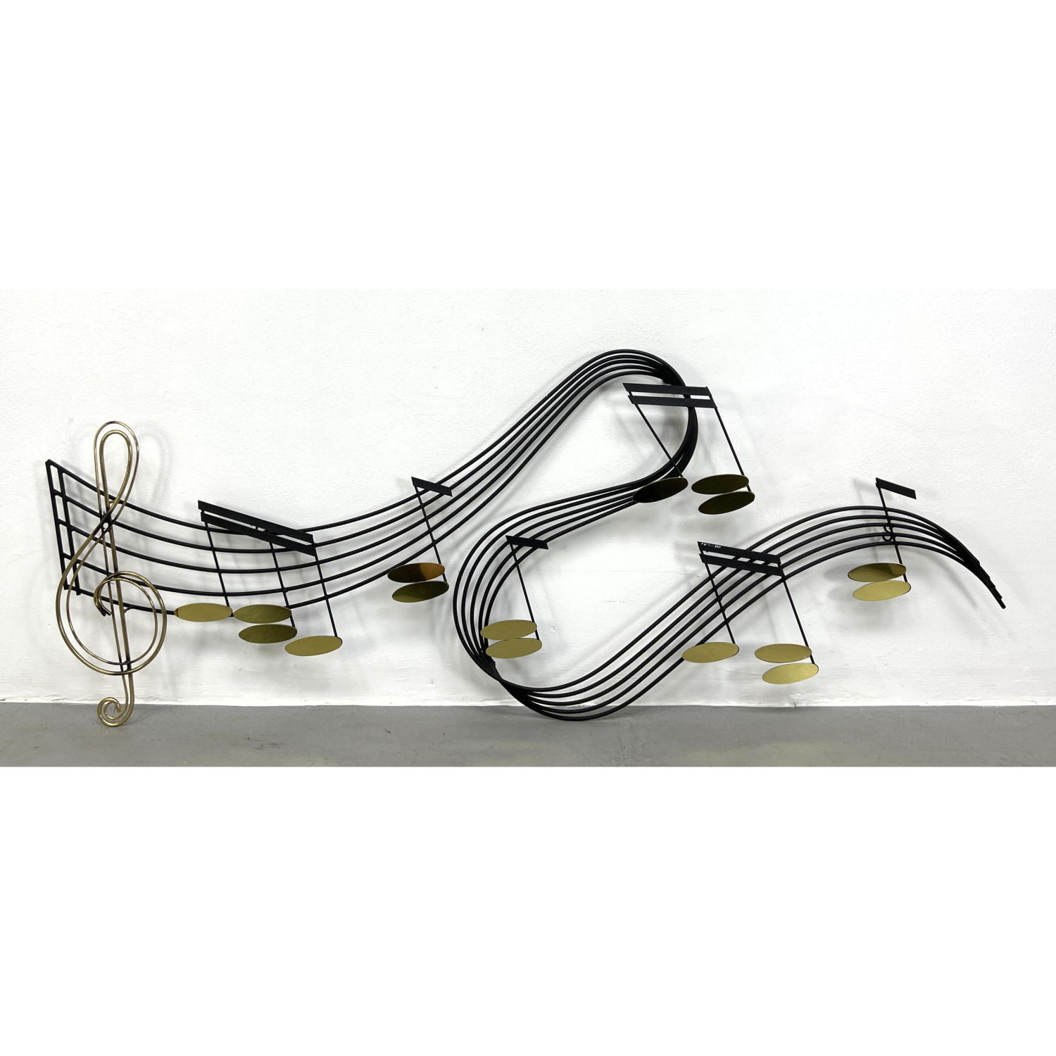 Appraisal: C JERE Brass and Black Metal Musical Wall Sculpture G