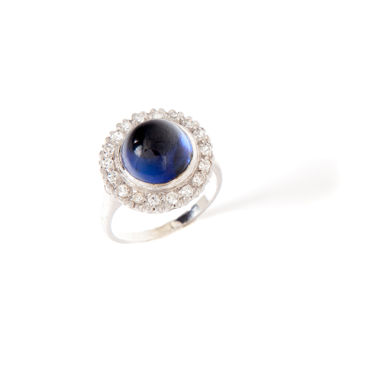 Appraisal: CABOCHON BLUE SAPPHIRE AND DIAMOND RING American st century Ladies'