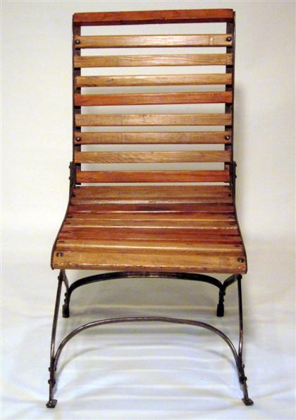 Appraisal: Steel and wood garden chair early th century