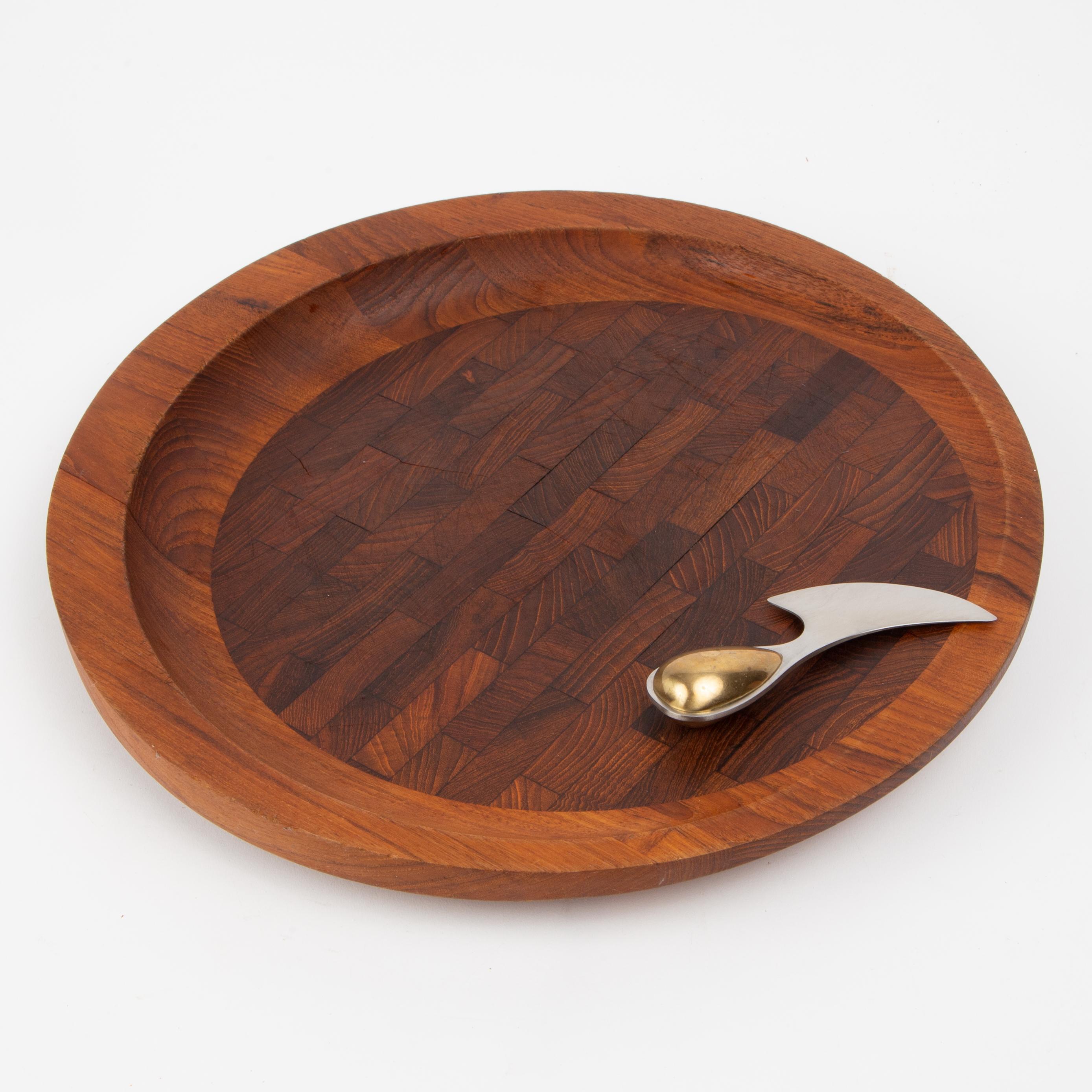 Appraisal: JENS QUISTGAARD FOR DANSK CUTTING BOARD WITH KNIFE Round teak