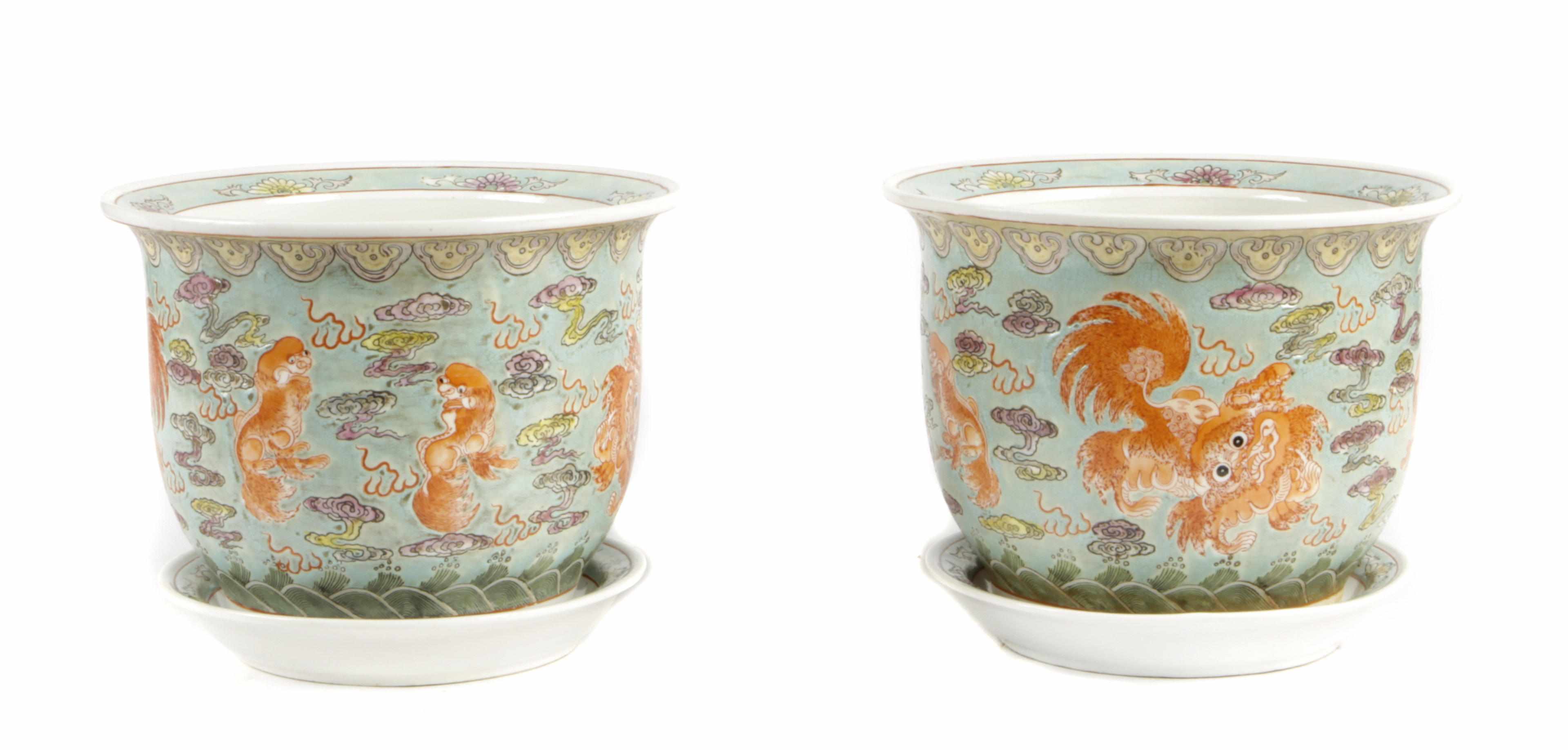 Appraisal: A pair of Chinese porcelain jardinieres with under plates th