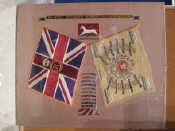 Appraisal: An embroidered panel depicting the flags and battles of the