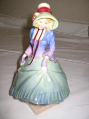 Appraisal: A ROYAL DOULTON FIGURE PANTALETTES with green bonnet and skirt