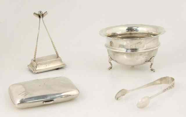 Appraisal: A silver golfing trophy marks rubbed a silver sugar bowl