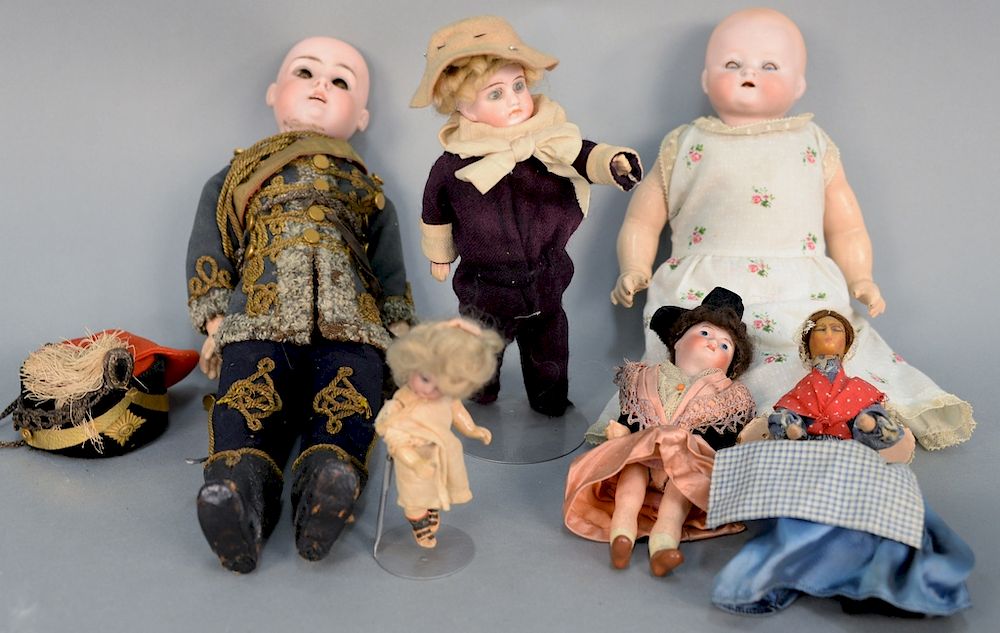 Appraisal: Six dolls including Unis France bebe doll in miniature bisque