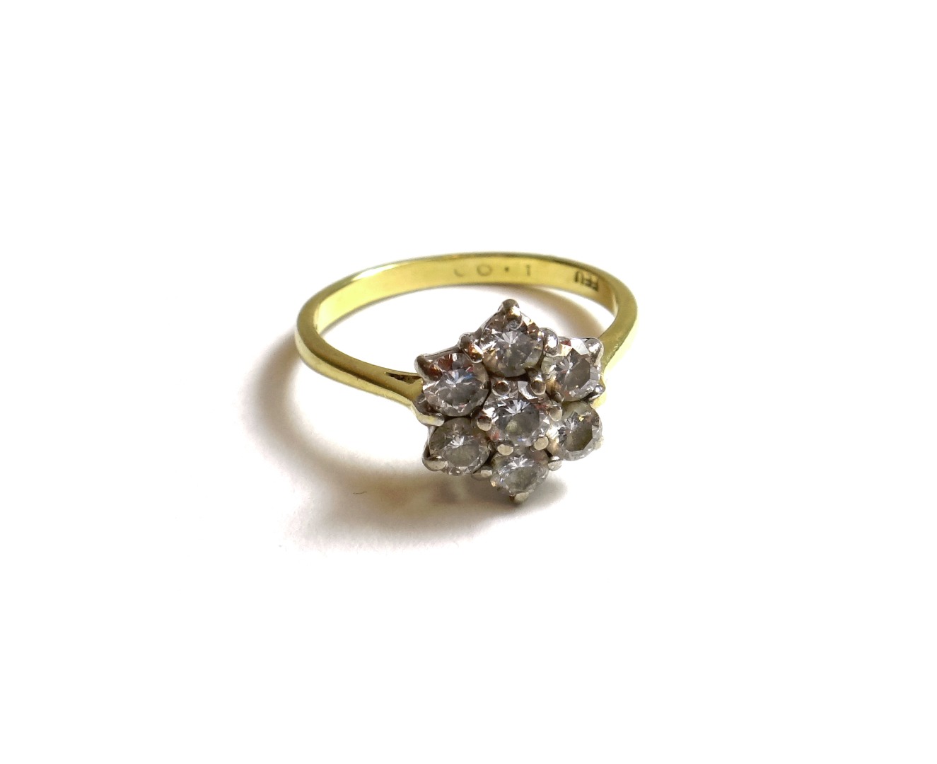 Appraisal: An ct gold and diamond set seven stone cluster ring