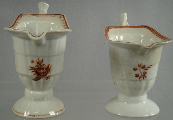 Appraisal: Chinese export porcelain helmet form pitchers with red floral decoration