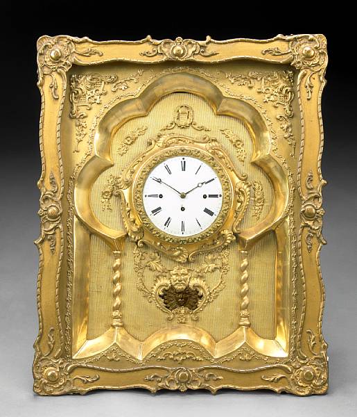 Appraisal: A Napoleon III giltwood and gilt metal quarter chiming clock