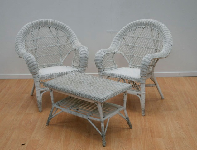 Appraisal: A white painted wicker suite including two chairs and a