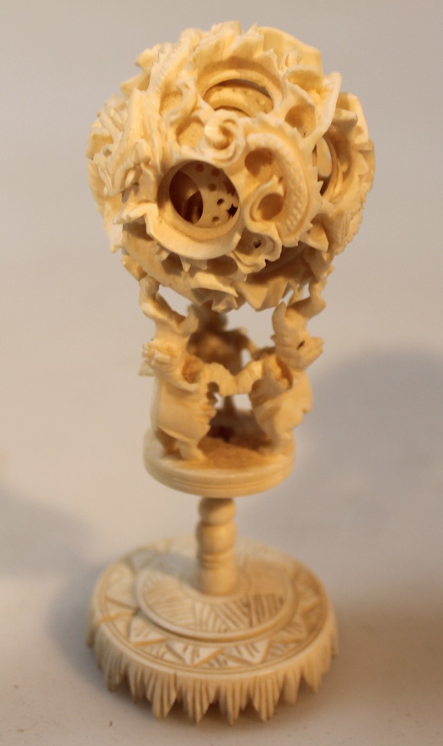 Appraisal: An early th Chinese ivory puzzle ball of typical form