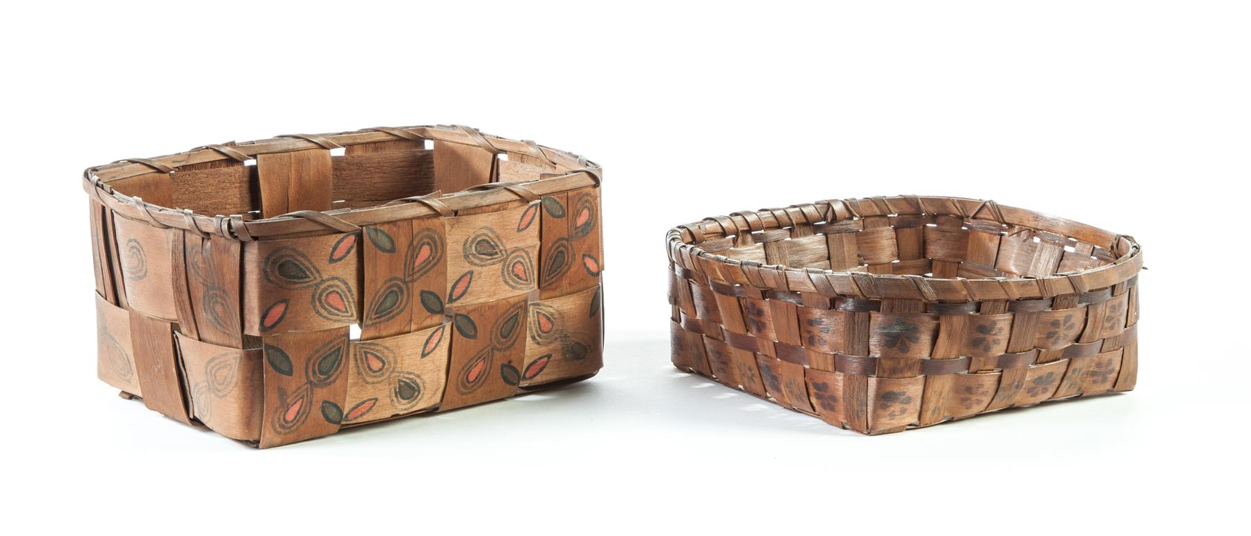 Appraisal: TWO DECORATED WOODLANDS BASKETS Early th century Woven splint with