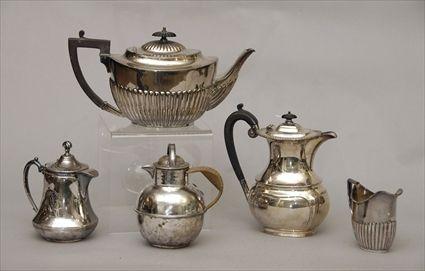 Appraisal: Four Silver-Plate Pots together with a Creamer Provenance from the