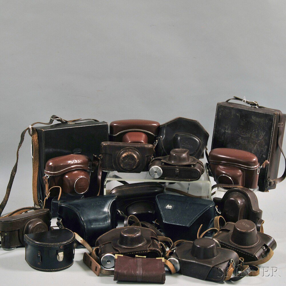 Appraisal: Collection of Miscellaneous Camera Cases and Straps including fitted leather