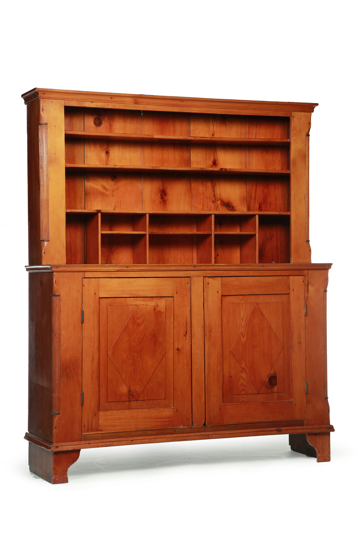 Appraisal: MIDWESTERN STEPBACK CUPBOARD Nineteenth century pine One-piece cupboard with open