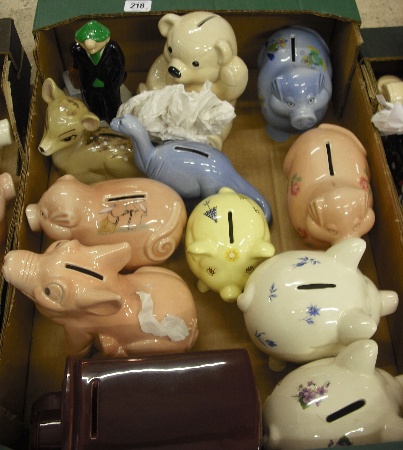 Appraisal: Collection Of Various Wade Money Boxes comprising Andy Cap Xmas