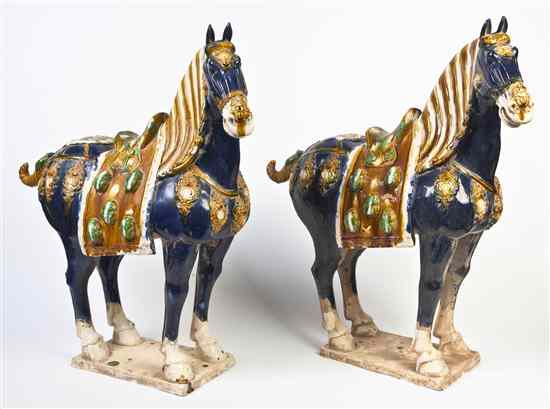 Appraisal: A Pair of Tang Style Pottery Horses each in standing