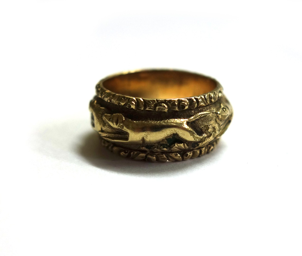 Appraisal: A th century gold-plated 'fox hunt' band ring the central