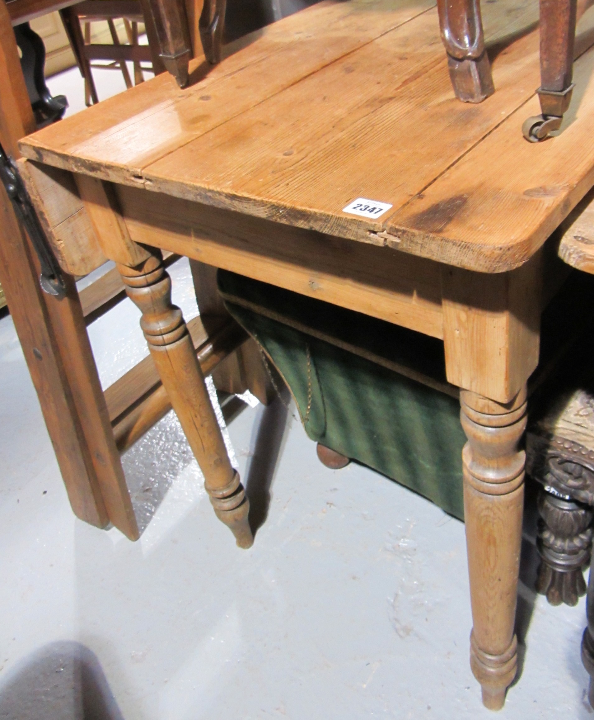 Appraisal: A th century pine rectangular table with single drop flap