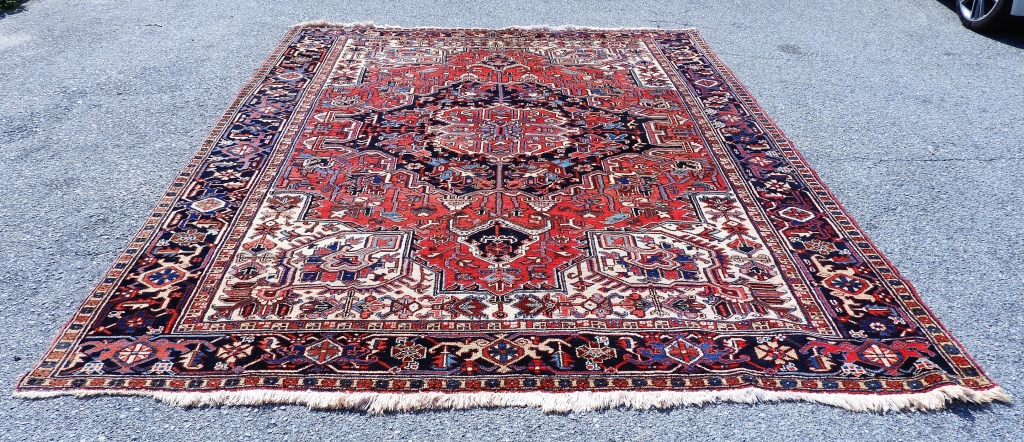 Appraisal: RED HERIZ BOTANICAL RUG Middle East Circa Blue navy blue