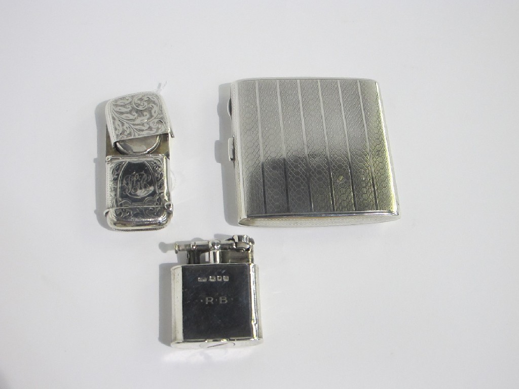 Appraisal: A lot comprising a silver cigarette case a silver lighter