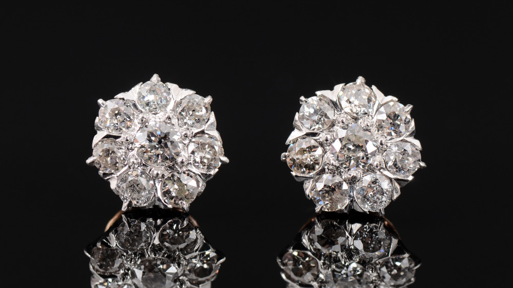 Appraisal: CTW DIAMOND EARRINGS K yellow and white gold stud earrings